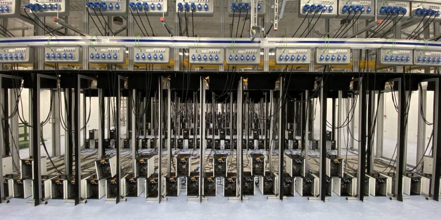 Rental load banks and dummy load servers by Alayan Rentals connected to distribution panels for data center testing.