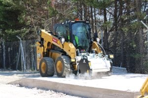 Black and white Simex PHD 450 hydraulic wheel trencher disc cutter attachment for excavators for rent – Alayan Rentals