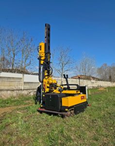 Alayan Rentals HD 1500 professional crawler post driver on rental, positioned at an outdoor job site