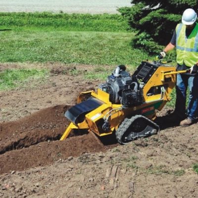 Rental motorized sod cutter by Alayan Rentals in operation for cutting and removing turf strips.