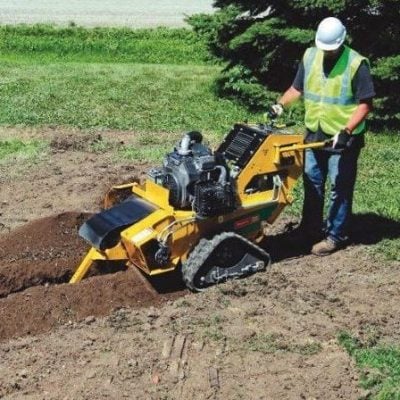 Rental motorized sod cutter by Alayan Rentals in operation for cutting and removing turf strips.