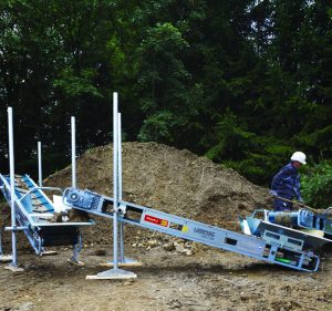Alayan Rentals modular conveyor belt system for rent operating on a construction site