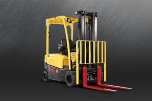 Yellow Hyster 2.5 counterbalance forklift with red forks and lifting mast for rent - Alayan Rentals